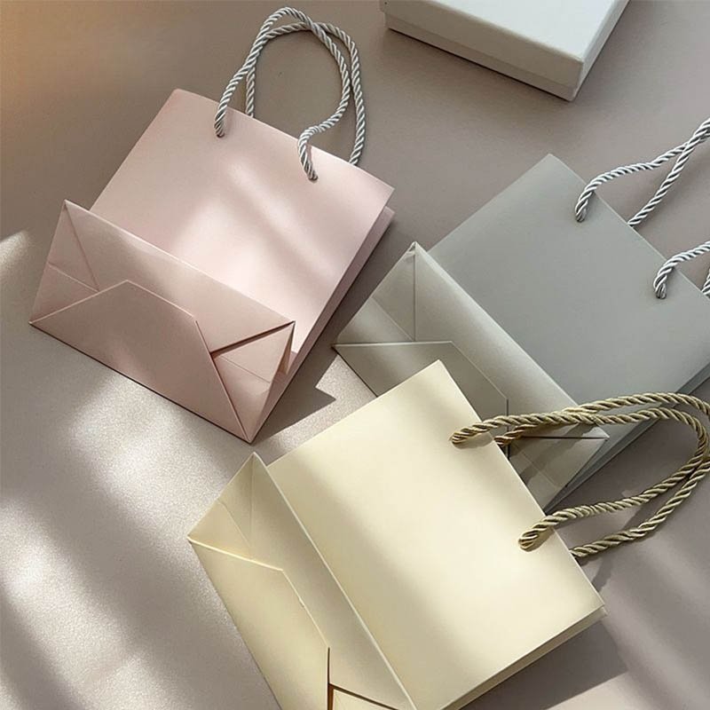 Custom Luxury Art Paper Tote Bag with Ribbon Handle Logo Printed Gift Shopper